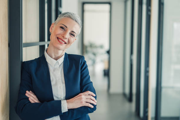 istock Confident businesswoman in modern office. 1487838852