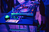 DJ console mixer at club
