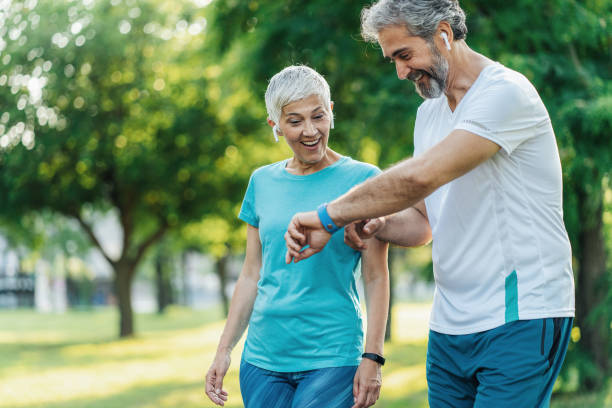 istock Senior friends jogging together 1487843865