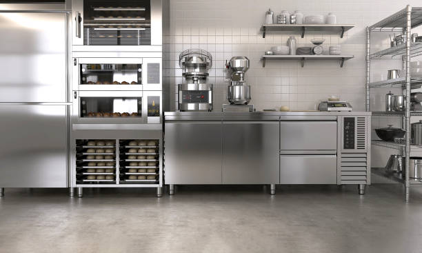 istock Commercial, professional bakery kitchen and stainless steel convection, deck oven, freezer, refrigerator, kneading machine, table, cabinet, bread, bun and ingredient 1487845792