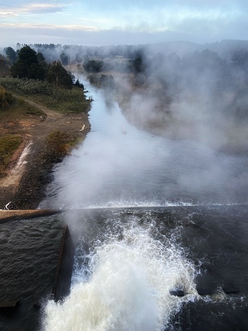Water spilling out of the overflow at Canberra's Scrivener Dam