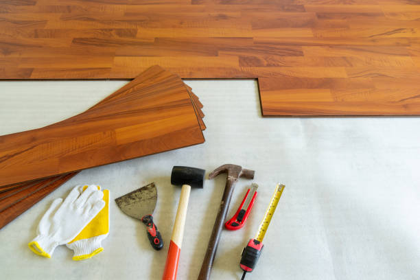 istock Wood laminate and tools at floor background texture. Wooden laminate top view 1487855382