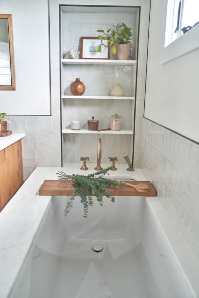 istock Bathroom white tile and natural wood. 1487855431