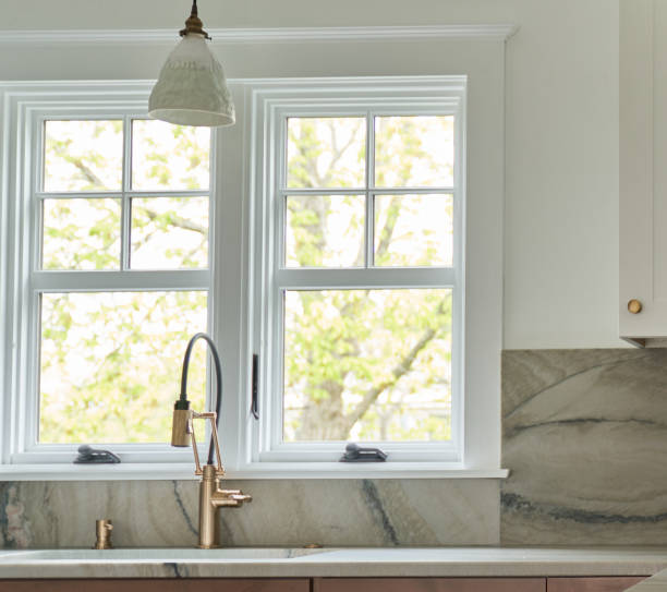 istock Kitchen window rose gold faucet and marble 1487855438