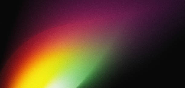 istock Vibrant rainbow colors noise texture background glowing red green yellow black color gradient blurred lights abstract webpage header design 1487864054