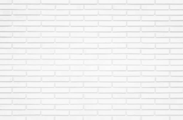 istock White grunge brick wall texture background for stone tile block painted in grey light color wallpaper modern interior and exterior and room backdrop design. Simple seamless pattern grid for backdrop. 1487867484