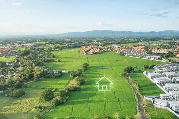 istock Green fields and dream house in aerial view. 1487867662