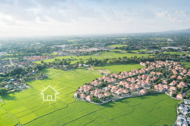 istock Green fields and dream house in aerial view. 1487867664