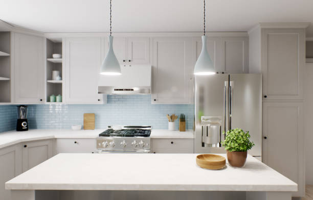 istock Spacious bright kitchen with a blue apron and blue chairs. 3d rendering. Focus on the marble countertop against the backdrop of kitchen appliances and utensils. 1487867685