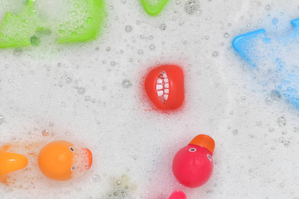 istock Rubber multicolored toys in a bubble bath 1487868082