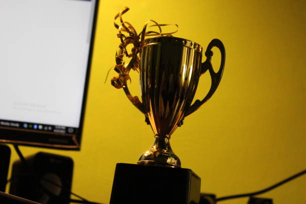 istock Golden Triumph: Celebrating Success with Glittering Trophies 1487871851