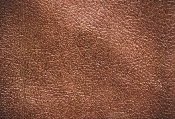 istock Genuine leather texture background. Dark brown, orange textures for decoration blank. Vintage skin natural suede with design line pattern or red abstract can use wallpaper or backdrop luxury event. 1487875305