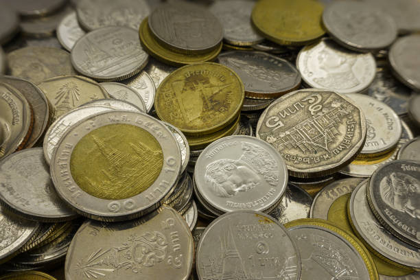 istock Pile of Thai coins macro close up. 1487876450
