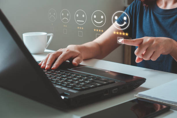 istock Customer review satisfaction feedback survey concept, woman using laptop computer with customer service and five stars satisfaction rating on the online web application. concept on a virtual screen. 1487878506
