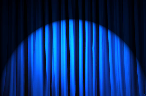 istock Brightly lit curtains in theatre concept 148787869