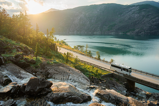 Scenic view of bus on road near Låtefossen  waterfall in Norway