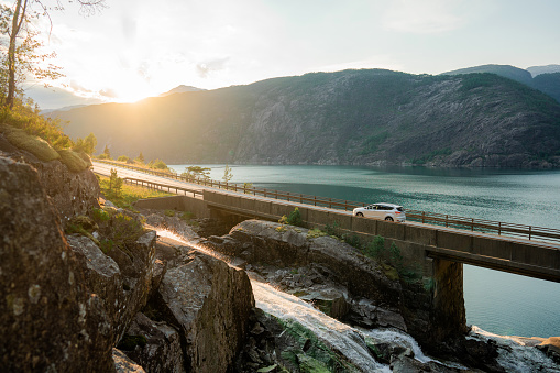 Scenic view of car  on bridge across the river in Norway