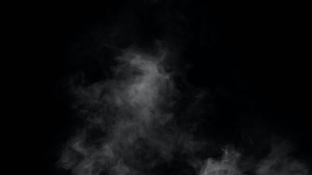 fumo bianco o nebbia isolati su sfondo nero. - mago artista di spettacolo foto e immagini stock