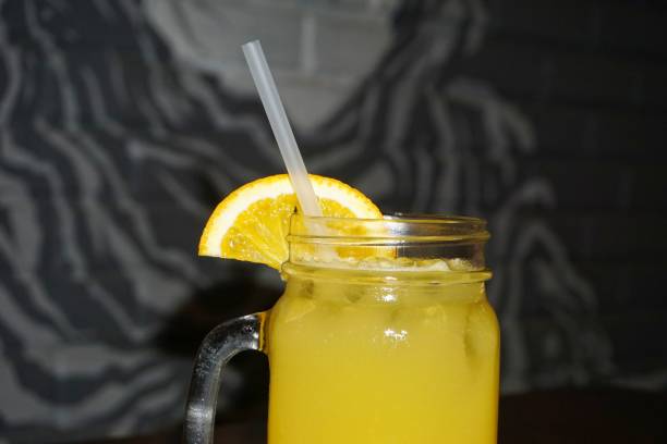 istock orange juice on a glass 1487889190