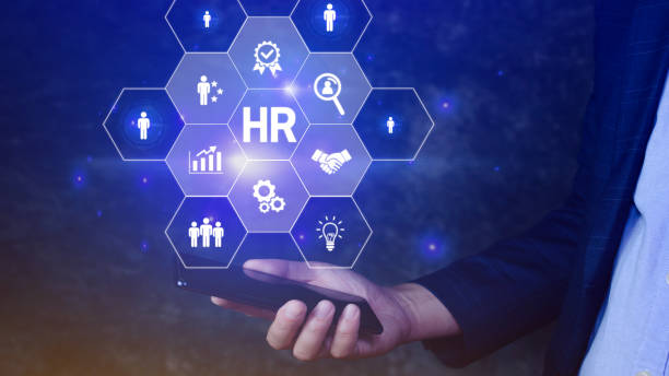 istock Businessman hand pressing human resources buttonon smartphone, Human resources, HR management, employment, headhunting concept. 1487894699