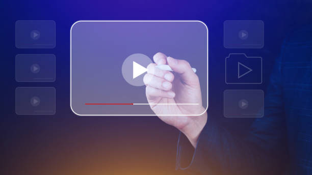 istock Businessman hands using for streaming online, watching video on internet, live concert, show or tutorial, content online. 1487894708