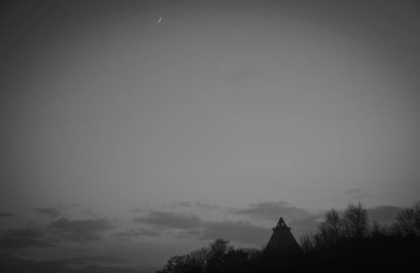 Crescent Moon over Minnehallen Monument in Stavern, Norway