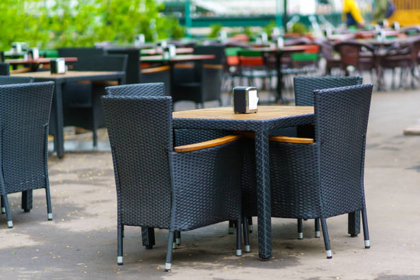 istock Empty outdoor cafe in early spring cloudy day 1487896232