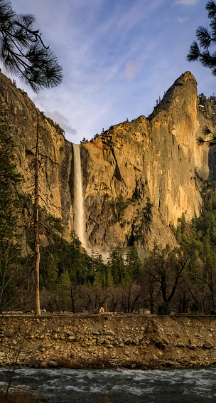 Scenic view of Yosemite Valley and Bridalveil Fall at sunset in the spring in the Yosemite National Park, Sierra Nevada mountain range in California