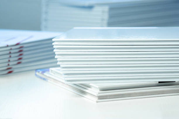 istock stack of photo books close-up, partial blur 1487900244