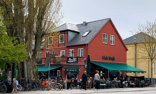 Trendy Cafe and restaurant situated  close to Frederiksberg have (garden) a beautiful public park. This photo was taken In Smallegade 31, Frederiksberg, Copenhagen 2000 Denmark on May 4th, 2023.