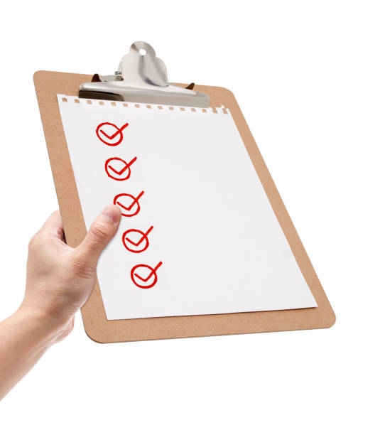 istock Checklist on clipboard isolated on white background 1487907395