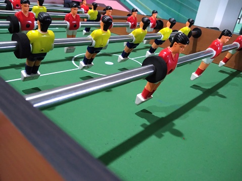 Table football is a soccer game that is played on a table.