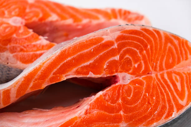 istock Raw salmon steaks. Salmon, trout, steak, piece of fresh raw fish. 1487909151