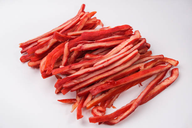 istock Dried crab meat snacks on a white background. Traditional snack for beer. 1487909257