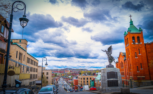 Sherbrooke city skyline, downtown street, St Patrick's Catholic Church and Sherbrooke War Memorial in Quebec, Canada