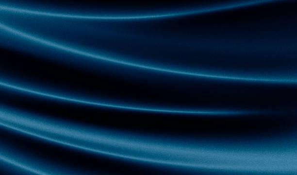 istock Abstract dark blue background. Silk satin. Navy blue color. Elegant background with space for design. Soft wavy folds. 1487918642