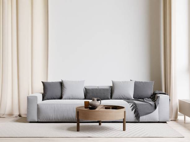 istock 3D rendering of a modern living room with a comfortable sofa against the wall 1487920955