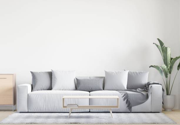 istock 3D rendering of a modern living room with a comfortable sofa against the wall 1487920966