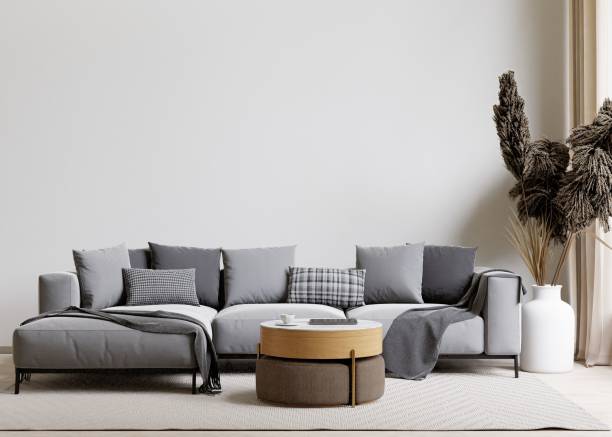 istock 3D rendering of a modern living room with a comfortable sofa against the wall 1487920974