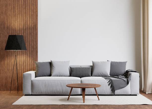 istock 3D rendering of a modern living room with a comfortable sofa against the wall 1487920983