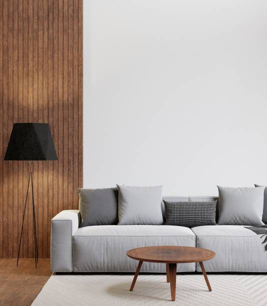 istock 3D rendering of a modern living room with a comfortable sofa against the wall 1487920985