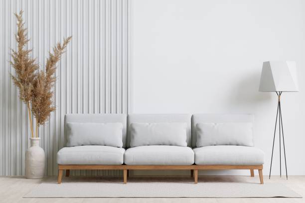 istock 3D rendering of a modern living room with a comfortable sofa against the wall 1487921017