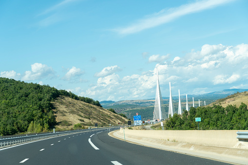 MILLAU AVEYRON FRANCE ON SEPTEMBER 2020: Viaduct de Millau, crossing the Tarn Valley in the Larzac region of France. One of the world s highest bridges, and the longest cable-stayed bridge in the world.