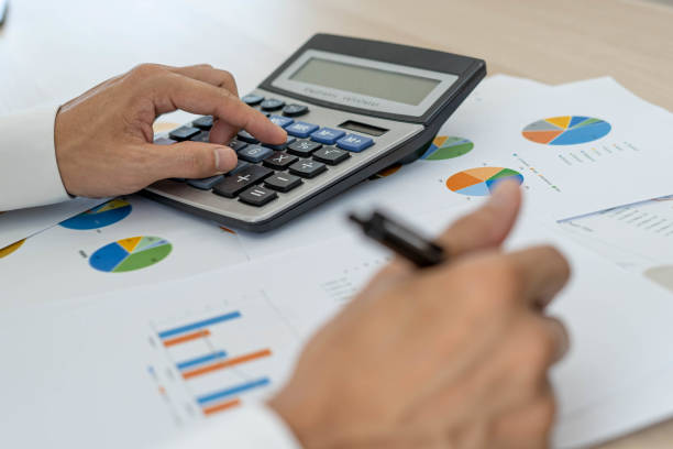 istock Business men looking at charts, spreadsheets, graph financial development, bank accounts, statistics, economy, data analysis, investment analysis, stock exchange 1487924481