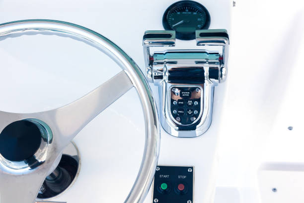 istock Motor yacht control panel. Steering wheel, gear levers, control button tachometer. Luxury yacht navigation bar. 1487933568