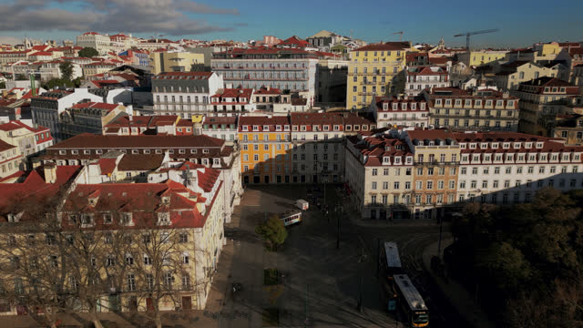 Aerial images  city neighbourhood of Lisbon in the middle of multicolor buildings and streets facades on residential area