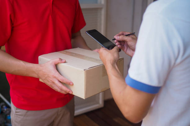 istock Online orderers and Delivery Man. 1487935205