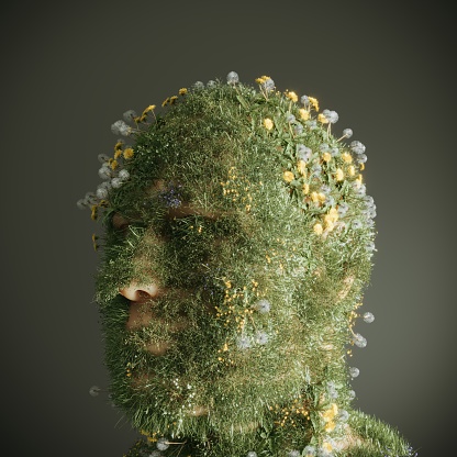 An abstract human head made out from grass, meadows and flowers. (3d render)