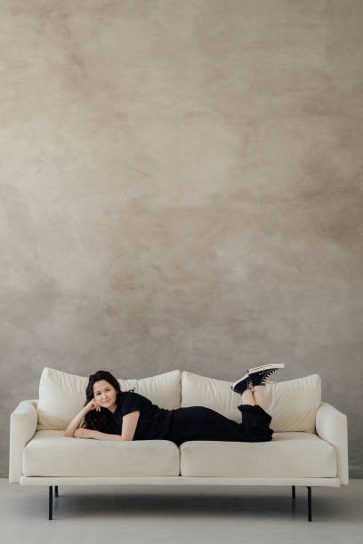 istock woman in black clothes 1487937647