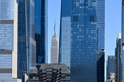 New York City, United States, April 9, 2023 - Empire State Building seen from Hudson Yards, New York City.